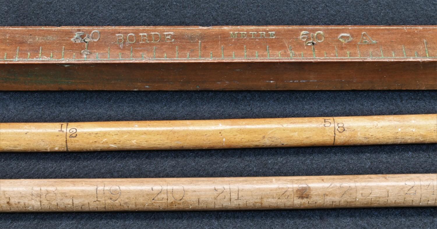 A 19th century French measuring stick, marked Borde, Metre and Centimetre, 100cm long; a draper's - Image 3 of 4