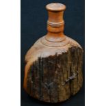 Treen - an interesting New Zealand salvaged timber bottle, inscribed 'NZ Totara Fence Post Bottle