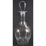 A large 19th century glass globular decanter, of magnum size, quite plain, outswept circular collar,