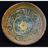 Antiquities - a 10th century East Persian terracotta flared bowl, painted and decorated in the