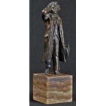 Continental School (early 20th century), a dark patinated bronze, of a gentleman with top hat,