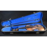 A violin, the two-piece back 36cm excluding button, outlined throughout with purfling,