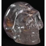 Memento Mori - an amethyst crystal skull, of small proportions, 5cm long, [1]