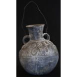 Tribal Art - an African black earthenware amphora-shaped vessel, the globular body with pinched