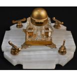 A Victorian Gothic Revival gilt brass and white onyx shaped square inkstand, Betjemann's patent well