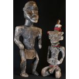 Tribal Art - an African figure, possibly Democratic Republic of Congo, crouching, with scarified