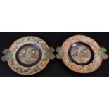 A pair of 19th century Japonesque papier-mâché comports, decorated in the typical manner with