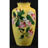 A Chinese cloisonne enamel ovoid vase, decorated with flowers on a yellow ground, 18.5cm high