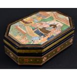 A Persian lozenge shaped box, hinged cover decorated in polychrome with a court scene, the sides