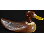 Folk Art - a 19th century carved and painted softwood decoy duck, probably American, brown, red and,