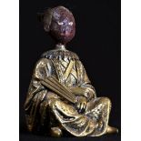 A 19th century Chinoiserie gilt bronze and composition novelty glue pot, cast as a Chinese man,