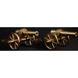 A pair of well engineered early 20th century scratch-built brass desk model cannons, each field