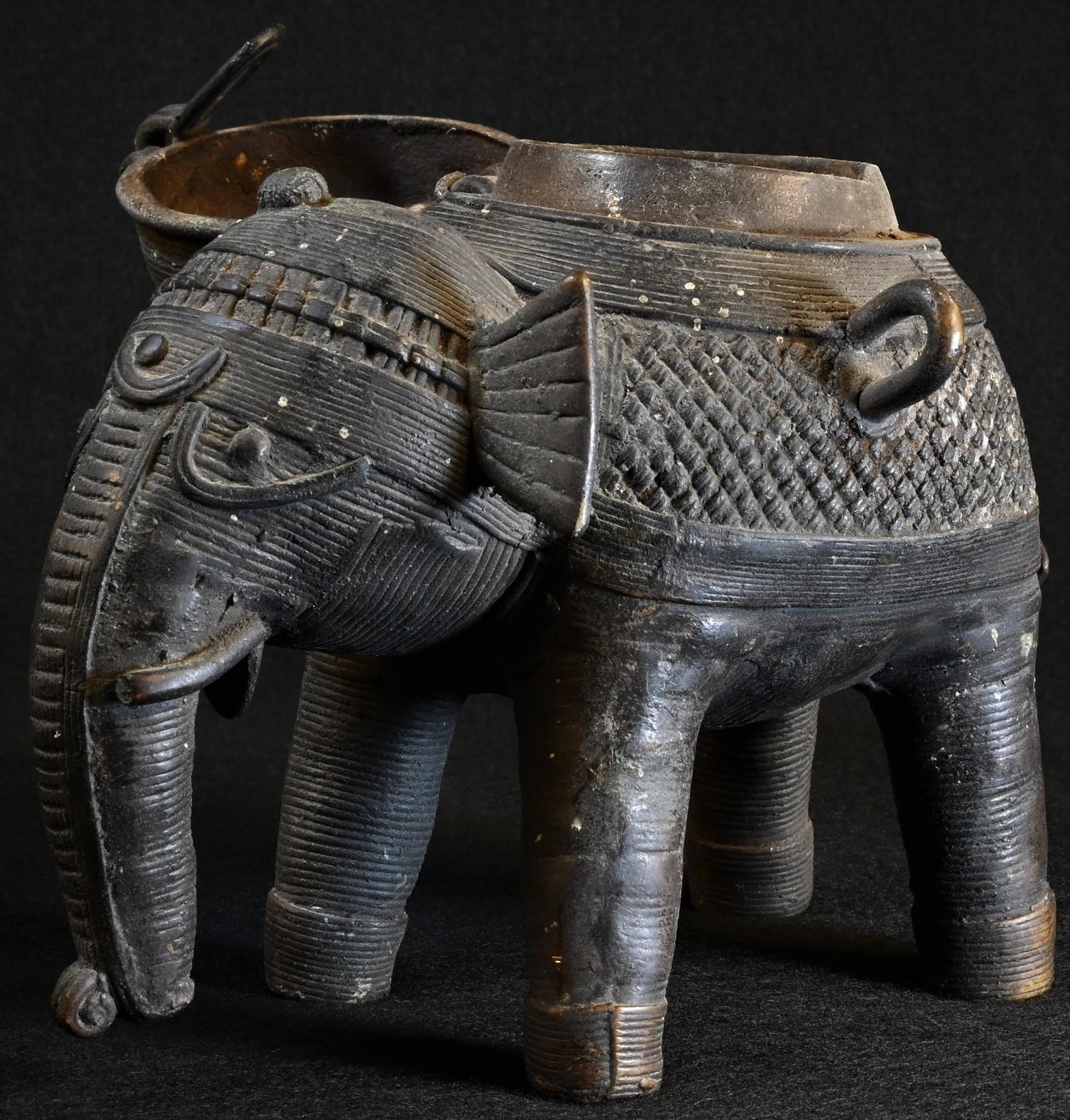 A 19th century Indian dark-patinated bronze censer, as an elephant, the hinged cover as a stylized - Image 3 of 6