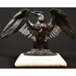A 19th century dark patinated bronze desk model, of an Imperial eagle, marble base, 24cm wide