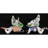 Erotica - a pair of Chinese porcelain figures, of lovers, each modelled reclining nude, picked out