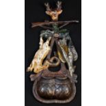 A cast iron novelty wall pocket spill holder, cast as a hunting trophy, polychrome painted, 30cm