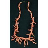 A pink coral necklace, 37cm long