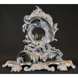 A 19th century Rococo Revival silver plated pocket watch stand, cast throughout with scrolling