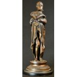 A late 19th century brown patinated library figure, of Sir Walter Scott, ebonised base, 37cm high