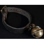 A 19th century leather animal collar, with brass crotal or rumbler bell, 16cm diam