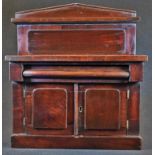 A Victorian mahogany miniature chiffonier, pointed arched back with open shelf, cushion moulded