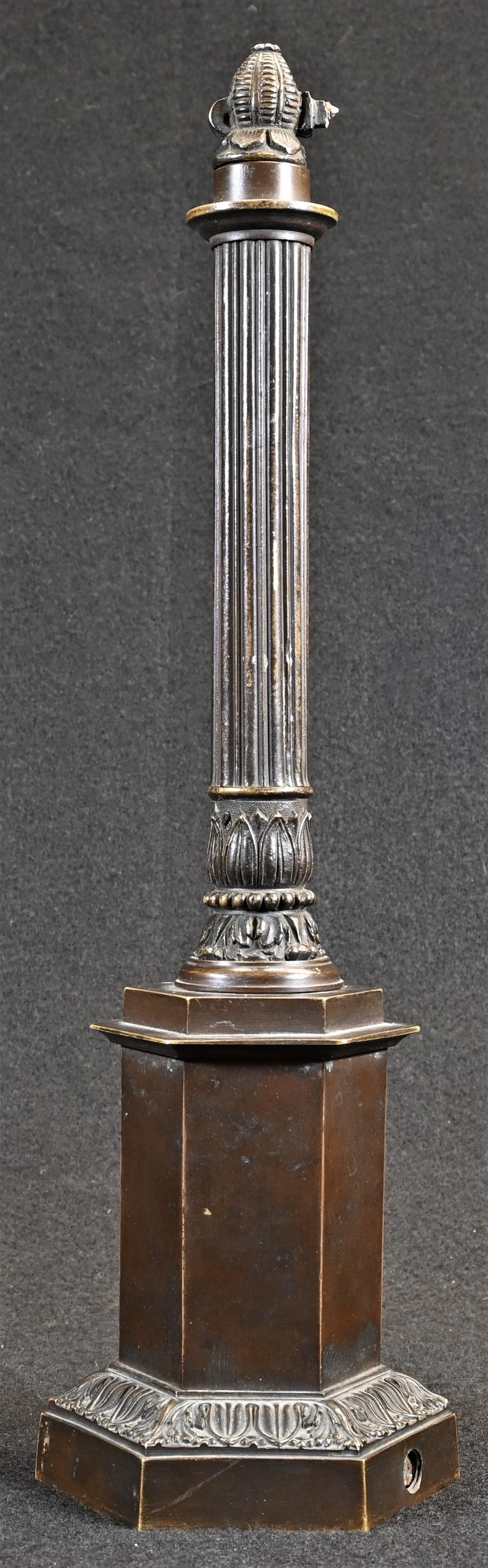 A 19th century dark patinated bronze bar light, pillar or lamp base, reeded column, hexagonal base