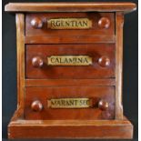 A small Victorian style 'apothecary's' mahogany table-top chest, moulded oversailing top above three