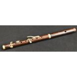 A 19th century rosewood piccolo, by Henry Potter & Co, London, 39cm long