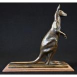 An early 20th century novelty bar lighter, cast as an Australian Kangaroo, standing, aperture to