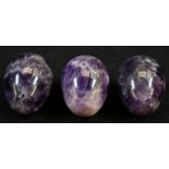 Geology - Three amethyst quartz egg shaped specimens, 4cm long; a canvas pouch (4)