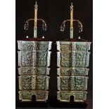 A pair of Chinese bronze adjustable two-branch table lamps, each as an Archaic fanglei vessel,