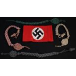 A Third Reich Nazi German N.S.D.A.P armband; a collection of lanyards (5)