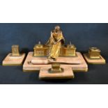 A substantial French Belle Époque gilt bronze and rose marble five piece gentleman's desk suite,