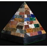 A pietra dura pyramidal desk model inlaid in malachite, lapis lazuli and other specimen stones