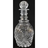 A 19th century French crystal globular decanter, probably Baccarat, leafy scrolling reservoir with