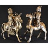 A pair of Chinese gilt bronze censers and covers, cast as immortals mounted upon a horse and a deer,