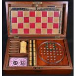 An Edwardian mahogany games compendium, hinged cover enclosing chess board, solitaire and an