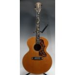 A Gibson J-185 Rose Vine Acoustic guitar, Bozeman, Montana USA, figured maple body back and sides,