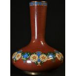 A Chinese cloisonne enamel compressed baluster vase, decorated in polychrome with a band of stylised