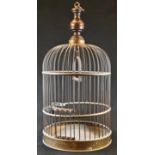 An early 20th century brass domed bird cage, turned beech cresting pillar, stirrup-shaped perch,
