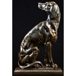A brass country house door stop, cast as a seated dog, rectangular base with acanthus border, 33cm