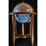 A Replogle World Classic Series 12" diameter terrestrial globe, the hardwood stand in George III