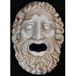 A Grand Tour style composition Greek tragedy mask, probably of Oedipus, after the Ancient Greek