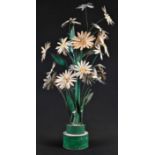 An unusual toleware flower display, naturalistically painted, weighted base, 59cm high