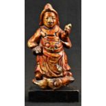 A Chinese cast and lacquered figure, of an immortal, 17.5cm high, collector's display plinth