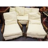 A Bergere three piece suite comprising three seat sofa, double cane work back and arms, two