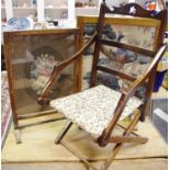 An Art Nouveau folding steamer/yacht chair, pierced top rail, floral upholstered seat; two oak