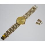 A 9ct gold Sovereign gentleman's wristwatch, 9ct gold link strap, gold coloured dial, baton markers,