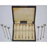 A cased set of six silver cocktail sticks with cockerel terminals, Barker Brothers, Birmingham,