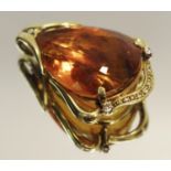 An 18ct gold mounted teardrop amber coloured citrine & diamond pendant 14.8g gross